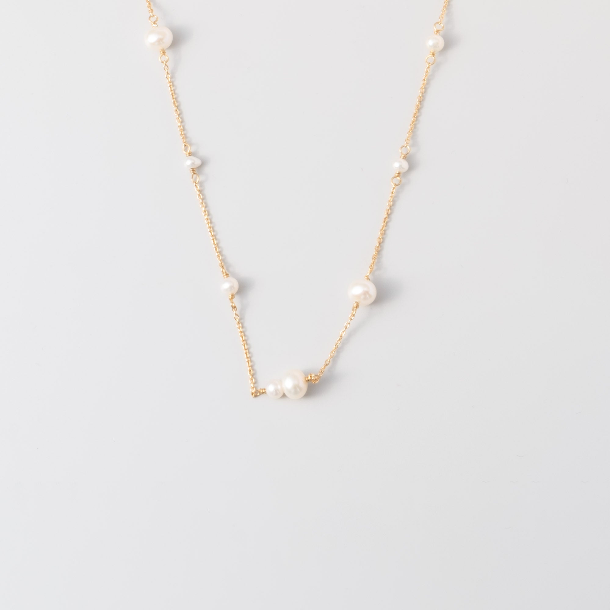 station pearl necklace