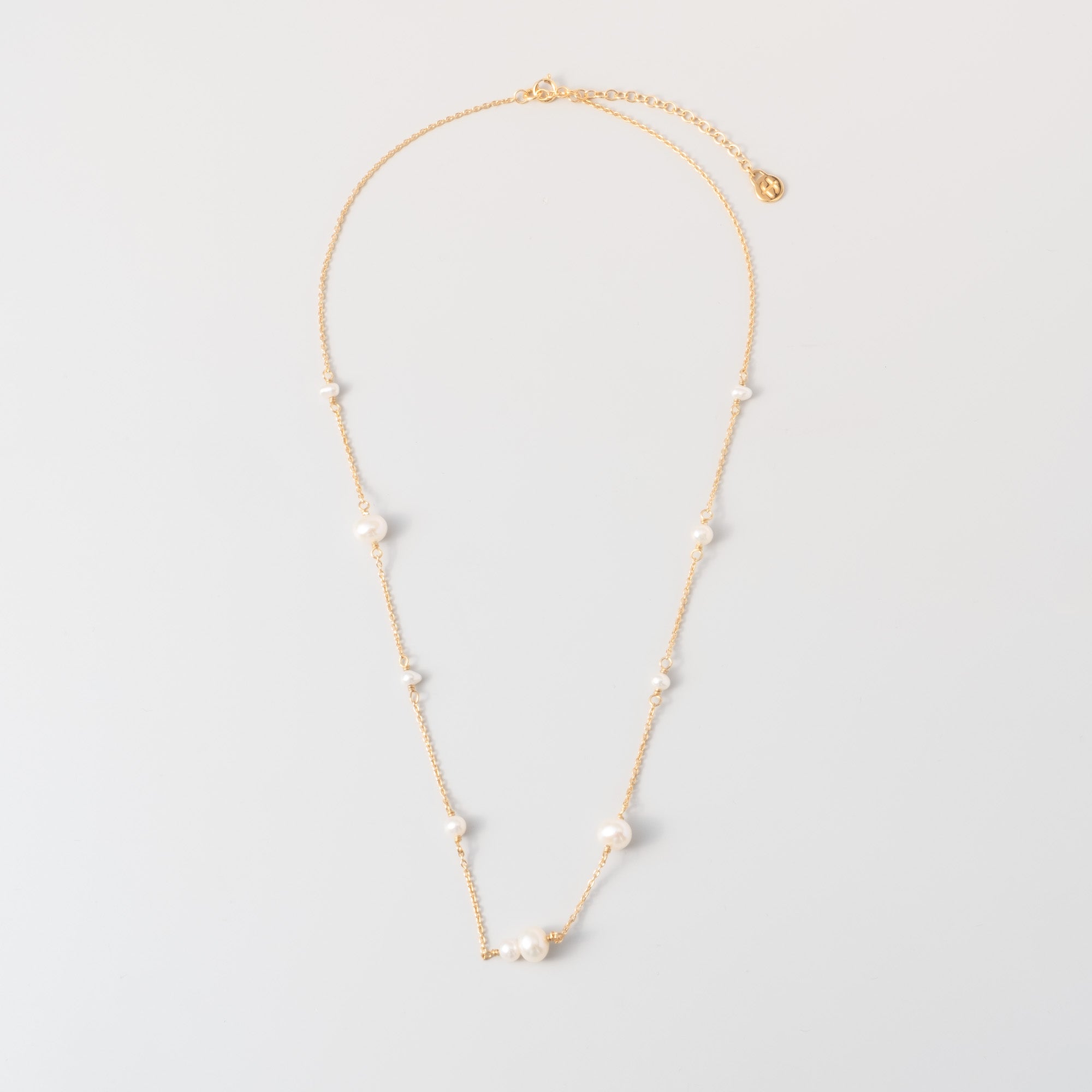 station pearl necklace
