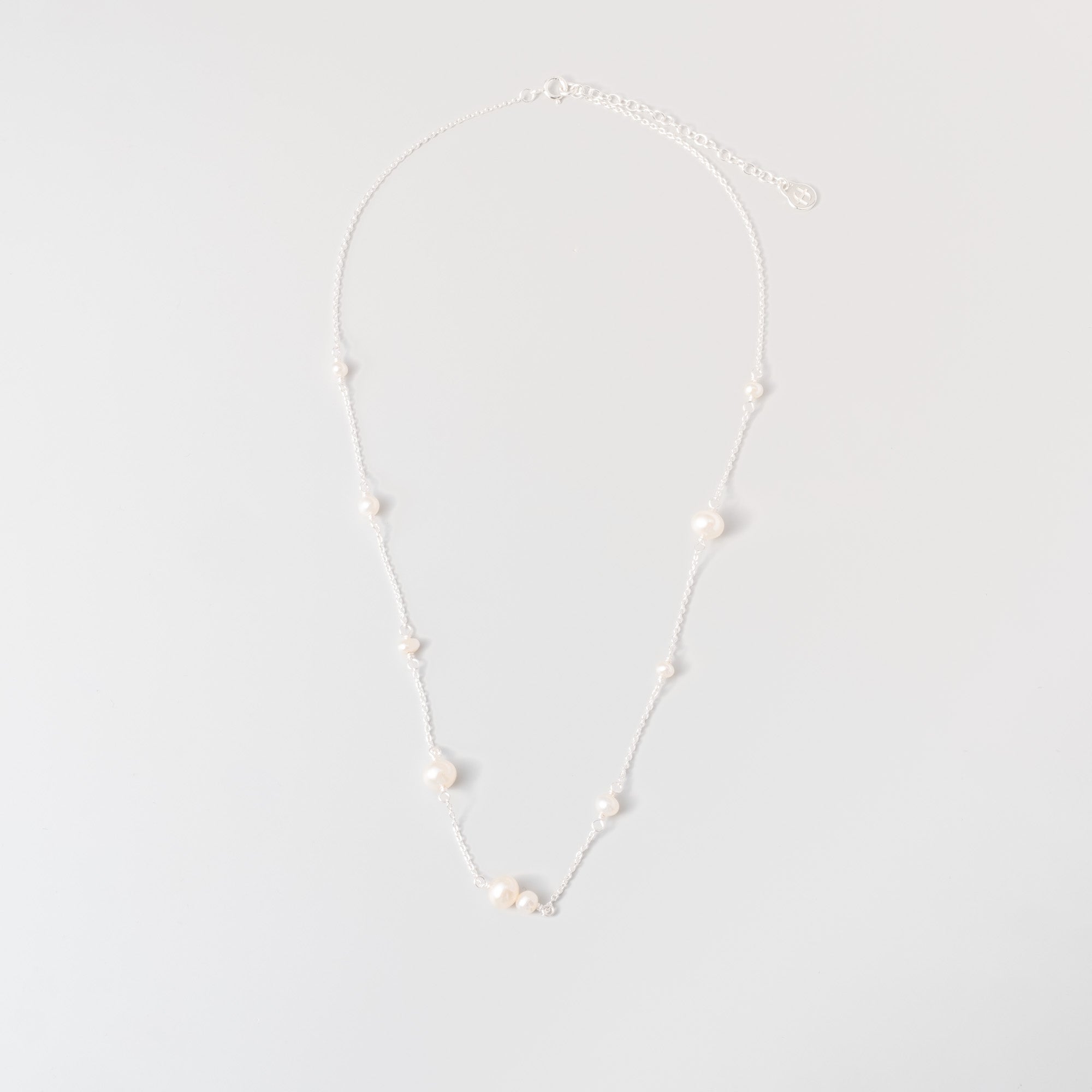 station pearl necklace