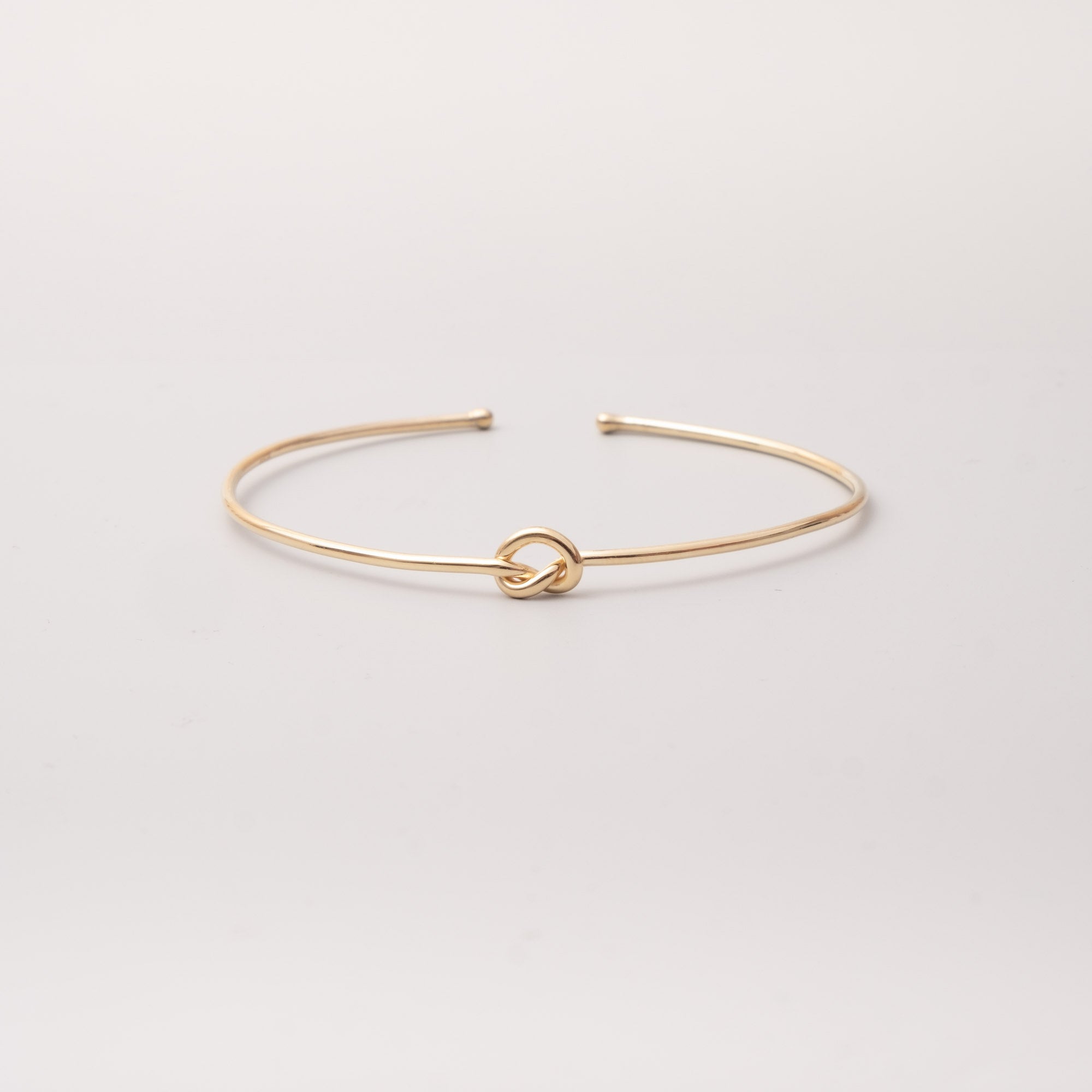 knot arm cuff