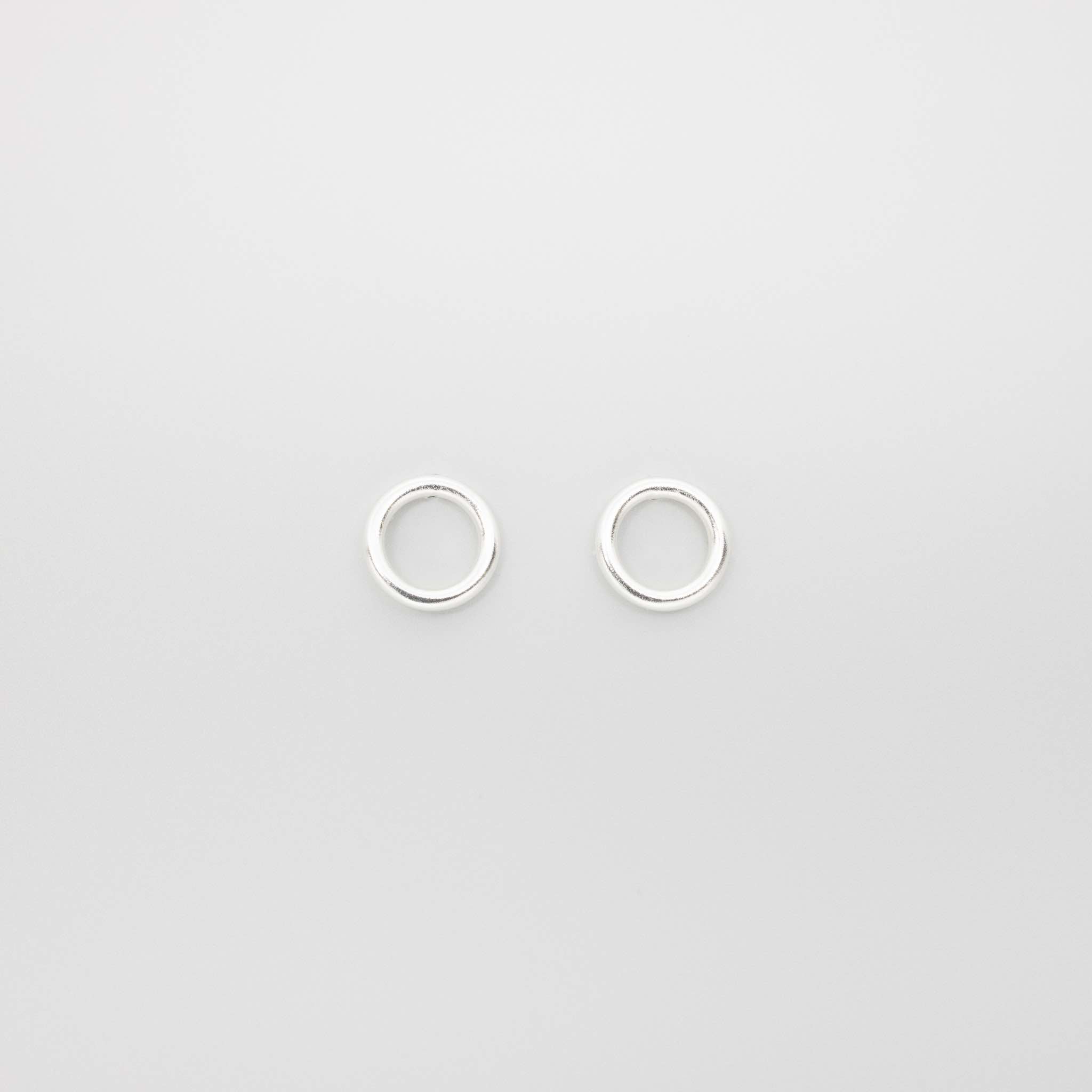 shiny circle studs