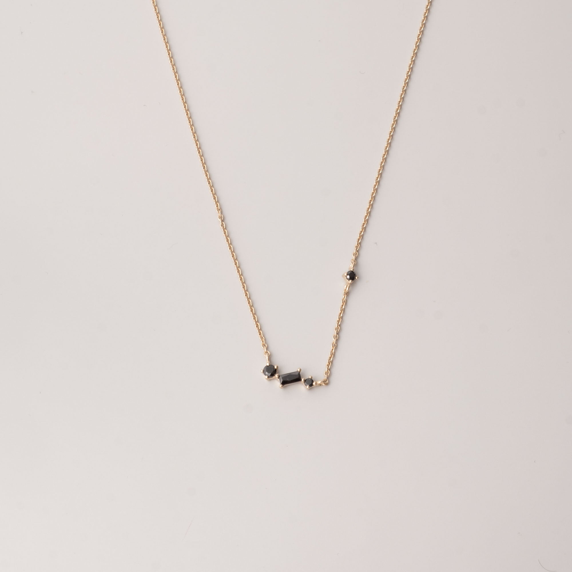 black baguette necklace gold