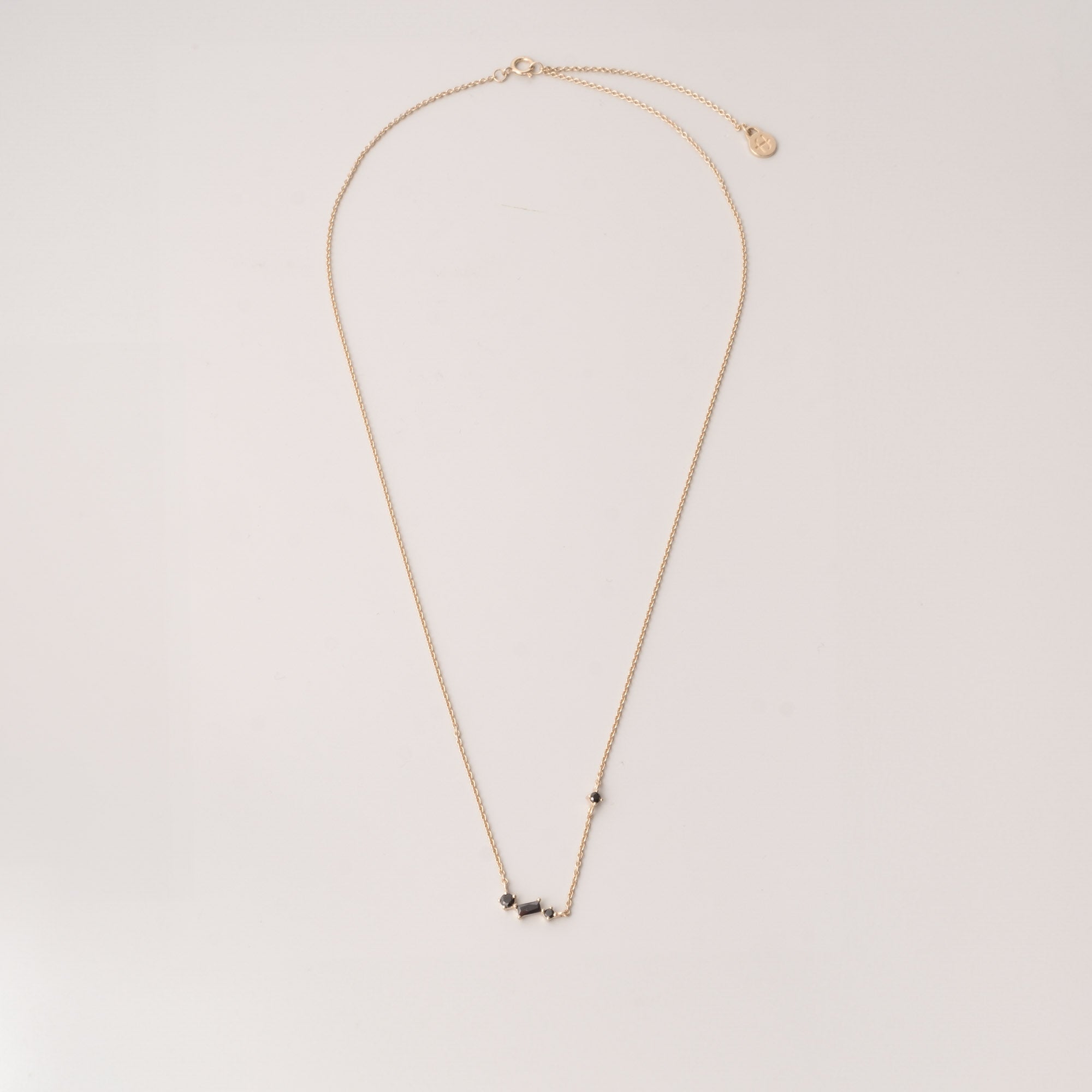 black baguette necklace gold