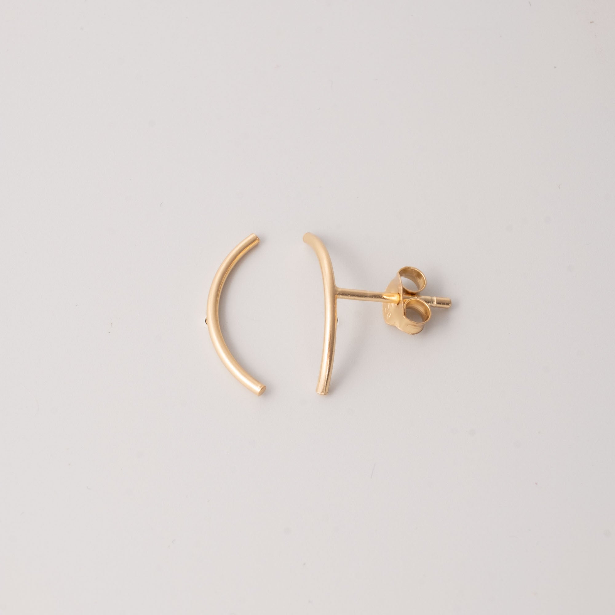 curved stud gold