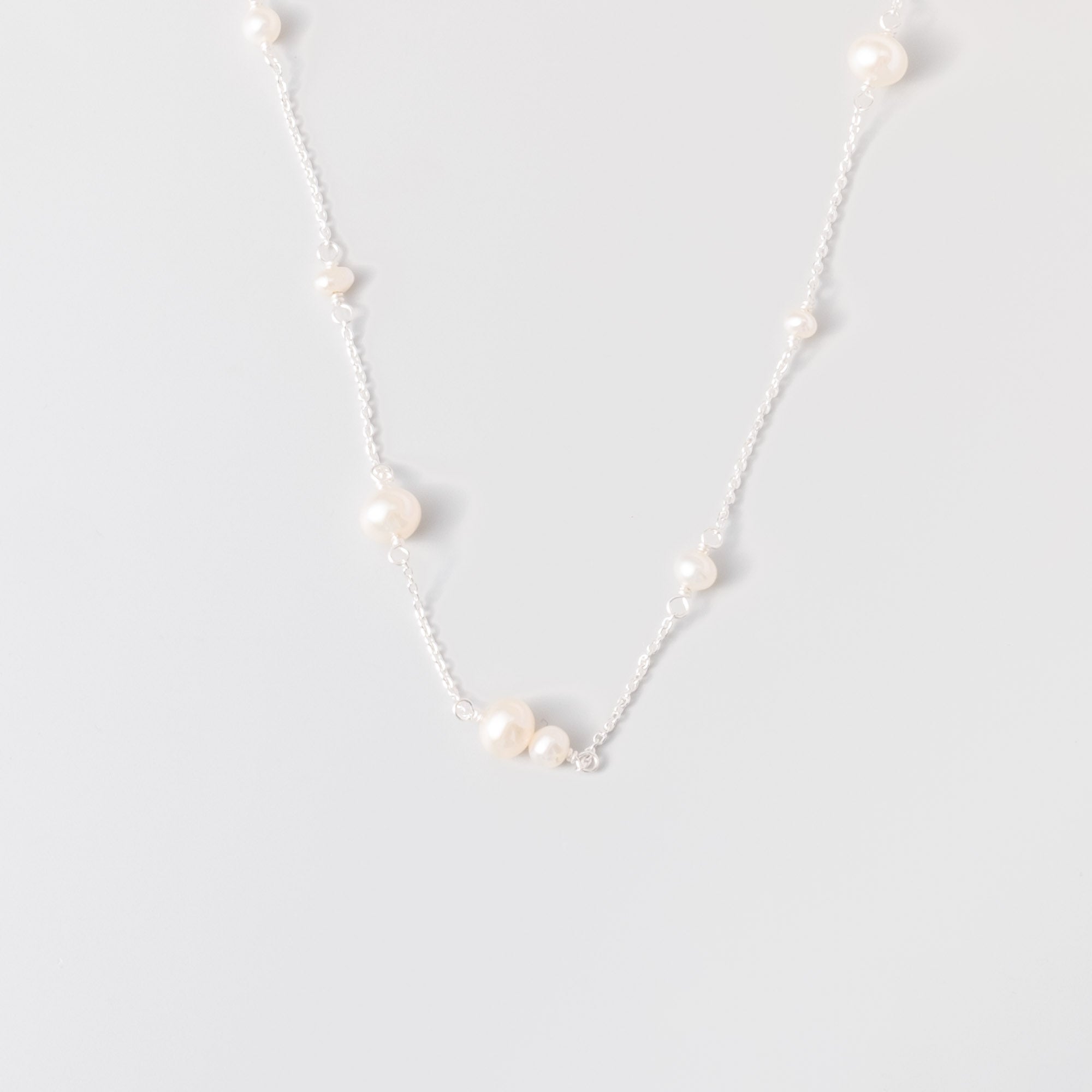 station pearl necklace