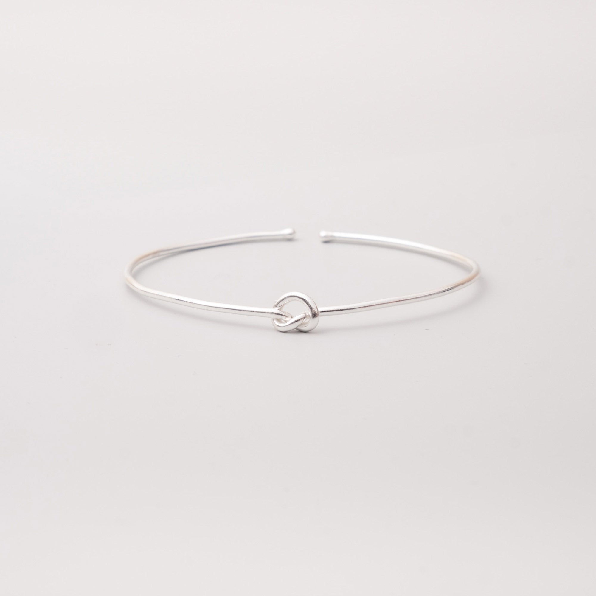 knot arm cuff