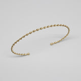 twisted arm cuff