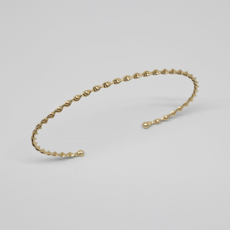 twisted arm cuff