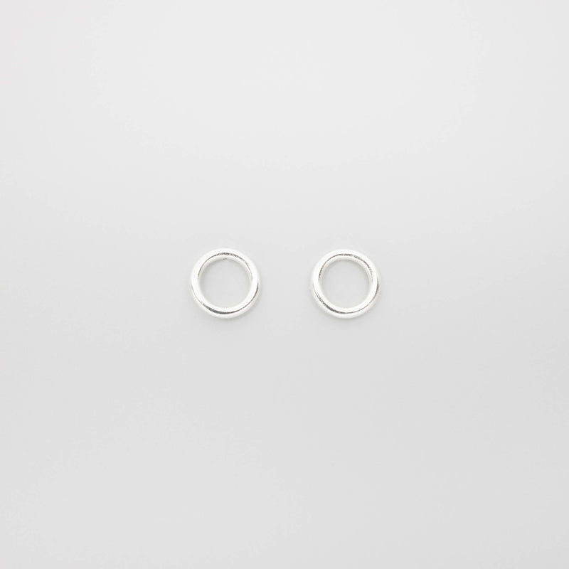 shiny circle studs